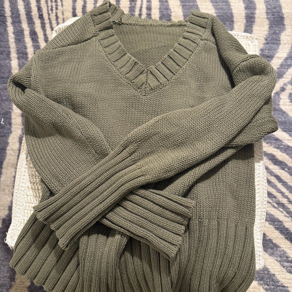 dark green sweater